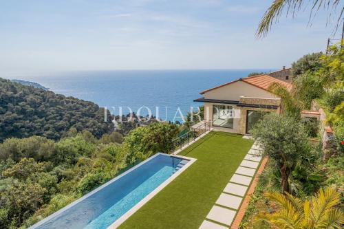 Superbe villa neuve avec piscine chauffée et vue mer exceptionnelle, proche de la Principauté de Monaco
